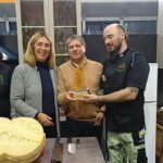 Cecilia Bottino, junto a los organizadores de Cocinarte..